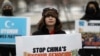Umer Jan, 12, takes part in a rally to encourage Canada and other countries to consider labeling China's treatment of its Uighur population and Muslim minorities as genocide, outside the Canadian Embassy in Washington, D.C., Feb. 19, 2021.