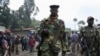 Waasi wa M23 wakitembea katika mji wa Karuba, kilomita 62 kutoka Goma, Kivu kaskazini, Mashariki mwa Jamhuri ya kidemokrasia ya Congo.
