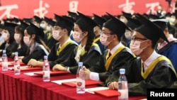 中國重慶郵電大學畢業生參加畢業典禮。（2022年6月22日）