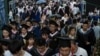 中國武漢華中師範大學畢業生參加畢業典禮。 （2021年6月13日）