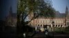 FILE - The Peace Palace housing the International Court of Justice is reflected in a monument in The Hague, Netherlands, May 1, 2024. 