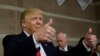 Republican presidential candidate Donald Trump gives thumbs up as he visits a caucus site Tuesday, Feb. 23, 2016.