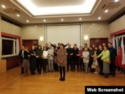 中國人權人士在歐盟人權日活動上高呼“全璋回家”。(李文足社媒圖片)