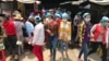 Garment Workers Fired for Violating Provincial Travel Ban 
