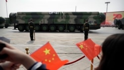 2019年10月1日，在北京舉行的中國國慶閱兵式上，裝載DF-41彈道導彈的軍車試過天安門廣場。中國擴大其核力量的速度遠遠超過美國官員的預測。（資料照片）