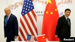 2019年6月29日，美國前總統特朗普與中國領導人習近平在日本大阪出席G20國領袖高峰會期間舉行雙邊會晤。
