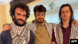 This undated handout photo provided by the Institute for Middle East Understanding shows Hisham Awartani, Tahseen Ali, and Kenan Abdulhamid, who were shot on their way to a family dinner.