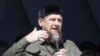 FILE - Head of the Chechen Republic Ramzan Kadyrov delivers a speech during a rally in support of Muslim Rohingya following the recent violence, which erupted in Myanmar, in the Chechen capital Grozny, Russia, Sept. 4, 2017.