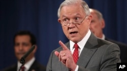 FILE - U.S. Attorney General Jeff Sessions, speaks at a news conference at the Justice Department in Washington, Aug. 4, 2017. Sessions led the U.S. side of talks with China on law enforcement and cybersecurity.
