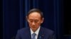 Impopulaire à cause du covid, le Premier ministre japonais jette l'éponge