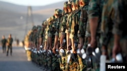 Des nouvelles recrues de l'armée syrienne à Damas, le 26 juin 2016