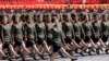 2018年9月9日，平壤庆祝朝鲜建国70周年的阅兵中，女兵走过。朝鲜阅兵包括人们熟悉的不少内容，包括军人走正步、坦克、榴弹发射器和各种导弹。但没有朝鲜所说的能够携带核弹头进入美国领土的洲际弹道导弹。 美国总统特朗普称之为&ldquo;一个重大和非常积极&rdquo;的表示。特朗普回应朝鲜对游行的评论说&ldquo;主题是和平与经济发展&rdquo;。总统引用他喜欢的福克斯新闻网的评论称&ldquo;专家认为，朝鲜没展示核导弹，向特朗普总统表明其对无核化的承诺。&rdquo;
