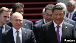 中國國家主席習近平和俄羅斯總統普京2019年6月14日在比什凱克出席上海合作組織峰會。（路透社）