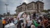 Pope Francis waves to wellwishers as he leaves after a meeting at the Cathedral of the Immaculate Conception in the capital Maputo, Mozambique, Sept. 5, 2019. 