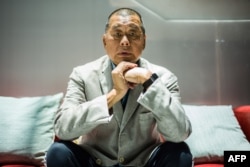 រូបឯកសារ៖ លោក​ Jimmy Lai ក្នុង​អំឡុង​ពេល​ផ្តល់​បទសម្ភាសន៍​ឱ្យ​ទីភ្នាក់ងារ​សារព័ត៌មាន AFP នៅទីក្រុង​ហុងកុង កាលពីថ្ងៃទី១៦ ខែមិថុនា ឆ្នាំ ២០២០។