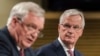 The EU chief Brexit negotiator Michel Barnier, right, and British Secretary of State David Davis address the media at EU headquarters in Brussels, July 20, 2017.
