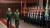 Russia's Defense Minister Sergei Shoigu and Myanmar's Min Aung Hlaing walk past the honor guard prior to their talks in Moscow, June 22, 2021. (Vadim Savitskiy/Ministry of Defense of the Russian Federation/Handout via Reuters)