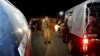 Pakistani police officers cordon off the area of a bomb blast in Raiwind near Lahore, Pakistan, March 14, 2018.