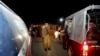 Police officers cordon off the area of a bomb blast in Raiwind near Lahore, Pakistan, March 14, 2018.