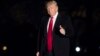 President Donald Trump gives a thumbs up to members of the media as he arrives at the White House in Washington, Feb. 20, 2017. 