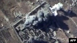 Image fixée d’une vidéo montrant des explosions après des frappes aériennes menées par la force aérienne russe sur un camp d'entraînement de l’État islamique dans la province syrienne d'Idlib. Séquence d’image disponible sur le site officiel du ministère russe de la Défense, 12 octobre 2015