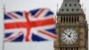 FILE - British Union flag waves in front of the Elizabeth Tower at Houses of Parliament containing the bell know as Big Ben in central London, March 29, 2017. 