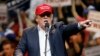 Republican presidential candidate Donald Trump speaks during a campaign rally Saturday, March 19, 2016, in Tucson, Arizona. 