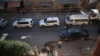 Vehicles of a UN and SARC aid convoy, with food, nutrition, health and other emergency items, enter the rebel-held town of Douma, east of the Syrian capital Damascus, June 10, 2016.
