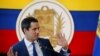 El líder de la oposición venezolana, Juan Guaidó, se dirige a los medios de comunicación el día después de las elecciones regionales y locales, en Caracas, Venezuela, el 22 de noviembre de 2021.