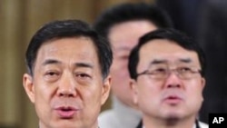 中共重慶市委書記薄熙來（左）和重慶市副市長王立軍（右）（資料照片）