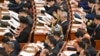 人大代表在北京出席中國第十四屆全國人民代表大會三次會議第二次全體會議。(2025年3月8日)