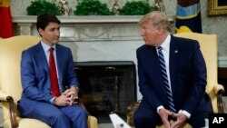 Le président Donald Trump rencontre le premier ministre canadien Justin Trudeau dans le bureau ovale de la Maison Blanche, le jeudi 20 juin 2019, à Washington. (Photo AP / Evan Vucci)