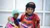 Saida Ahmad Baghili, 18, sits next to her relative at the al-Thawra hospital where she receives treatment for severe acute malnutrition in the Red Sea port city of Houdieda, Yemen, Oct. 25, 2016. 