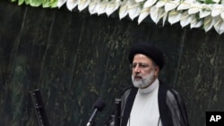 President Ebrahim Raisi delivers a speech after taking his oath as president in a ceremony at the parliament in Tehran, Iran, Thursday, Aug. 5, 2021. The inauguration of Raisi, a protégé of Iran's supreme leader, completes hard-liners' dominance of…