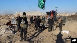 les forces irakiennes Ramadi, 70 miles (115 kilometers), oust de Baghdad, Dec. 26, 2015. 