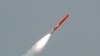 FILE - Pakistan's Babur Hatf VII cruise missile takes off during a test flight from an undisclosed location, July 26, 2007. 
