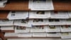 Old issues of the Cambodia Daily newspaper on display at the Daily's office, Phnom Penh, Cambodia, September 4, 2017. (Khan Sokummono/VOA Khmer) 