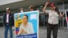 Supporters of Fernando Villavicencio shout slogans as they await the sentencing of five people in the assassination of the Ecuadorian presidential candidate, at the Judicial Complex in Quito, July 12, 2024.
