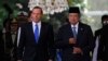 FILE - Australian Prime Minister Tony Abbott (L) walks beside Indonesian President Susilo Bambang Yudhoyono at the Presidential Palace in Jakarta, Sept. 30, 2013. 