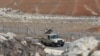 FILE - Jordanian soldiers patrol along the eastern Jordan-Syria border, in al-Washash, Mafraq governorate, Jordan, Thursday, Feb. 17, 2022. Jordan is believed to have carried out an airstrike against drug traffickers in Syria on Jan. 18, 2024.