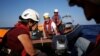 Aid workers from the aid group Sea-Watch carry out training drills off the coast of Malta in preparation for a mission in the Mediterranean to search for migrants attempting to reach Europe by boat from the Libyan coast, Nov. 2, 2016.
