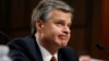 Director of the Federal Bureau of Investigation Christopher Wray testifies before a Senate Judiciary Committee hearing on "Examining the Inspector General's First Report on Justice Department and FBI Actions in Advance of the 2016 Presidential Election," on Capitol Hill in Washington, June 18, 2018.