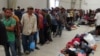 Central American migrants gather before continuing their journey to the U.S. despite President Donald Trump's vow to stamp out illegal immigration, in Ixtepec, Oaxaca, Mexico, March 31, 2018.