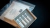 This undated photo provided by U.S. Centers for Disease Control and Prevention shows CDC’s laboratory test kit for the new coronavirus. 