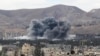 Smoke rises from an explosion in besieged Eastern Ghouta in Damascus, Syria, Feb. 27, 2018. 