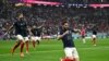 Mfaransa Theo Hernandez akishangilia baada ya kufunga bao lake la kwanza akiwa na Olivier Giroud . katika mechi ya Ufaransa dhidi ya Morocco uwanja wa AlBayt. REUTERS/Dylan Martinez.