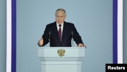 ប្រធានាធិបតីរុស្ស៊ីលោក Vladimir Putin ថ្លែងសុន្ទរកថាប្រចាំឆ្នាំរបស់លោកទៅកាន់សភាសហព័ន្ធនៅទីក្រុងមូស្គូ ប្រទេសរុស្ស៊ី នៅថ្ងៃទី២១ ខែកុម្ភៈ ឆ្នាំ២០២៣។