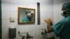 FILE - A Palestinian doctor washes his hands prior to performing a surgery at Shifa hospital in Gaza City, Jan. 27, 2009. Health officials see hand-washing as the single most important measure for preventing surgical site infections.