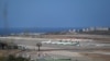 Aviones estacionados en el Aeropuerto de Internacional de Maiquetía, en La Guaira, Venezuela. [Foto de AP, del 21 de marzo de 2020].