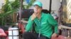 A man smokes a cigarette on Monday May 23, 2016 in Phnom Penh​ amid the government banning smoking in public areas. (Photo: Leng Len/VOA Khmer)